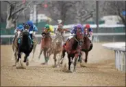  ?? PHOTO NYRA/ROBERT MAUHAR ?? Enticed, far left, with Junior Alvardo aboard Saturday afternoon along the turn of the Grade III Gotham for 3-year-olds at Aqueduct Racetrack.