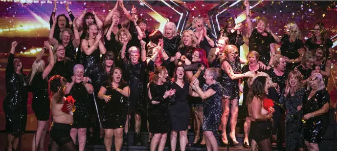  ??  ?? The Sea of Change Choir celebrate after Denise van Outen hit the golden buzzer to send them straight through to the live semi-finals of Ireland’s Got Talent.