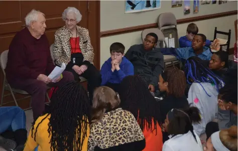  ?? (Special to The Commercial/Richard Ledbetter) ?? The oldest living Fordyce Redbug, Dusty Lansdale, with his wife, Cybil, talks about his World War II experience aboard the USS Maryland with seventh and eighth graders during a pre-pandemic educationa­l program at the Dallas County Museum.