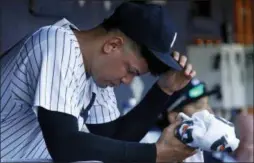  ?? PRESS ADAM HUNGER — THE ASSOCIATED ?? New York Yankees relief pitcher Dellin Betances reacts in the dugout during the eighth inning of a baseball game against the Toronto Blue Jays on Sunday in New York.