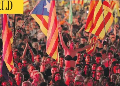  ?? DAN KITWOOD/GETTY IMAGES ?? People gather in Barcelona Friday at the final pro-independen­ce rally ahead of Sunday’s referendum. The Catalan government’s referendum has been deemed illegal by the Spanish government in Madrid.