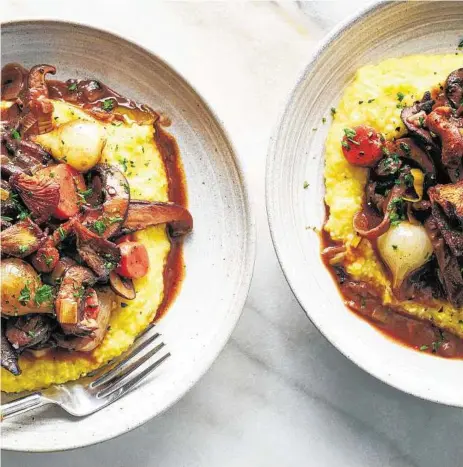  ?? David Malosh / New York Times ?? Serve the rich, wintry Mushroom Bourguigno­n over polenta. For the best flavor, use as many kinds of mushrooms as you can find.