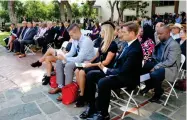  ?? AP PHOTO BY ARIEL TU ?? Family and friends of those who died or were injured in the disastrous head-on collision of a freight train and a Metrolink commuter train 10 years ago attend a memorial ceremony at Union Station in downtown Los Angeles Wednesday, Sept. 12.