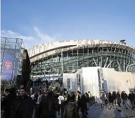  ?? Getty Images ?? Spurs vs Gunners: Fans arrive at Tottenham Hotspur Stadium in London before the Premier League match between Tottenham Hotspur and Arsenal on January 15.