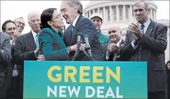  ?? ALEX WONG/GETTY ?? Rep. Alexandria Ocasio-Cortez, left, and Sen. Ed Markey at the U.S. Capitol on Thursday.