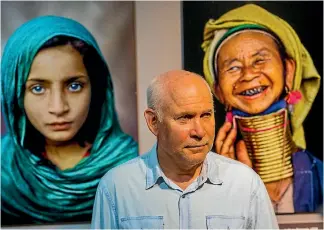  ?? PHOTO: GETTY IMAGES ?? Steve McCurry is pictured with some of his work at a recent exhibition.