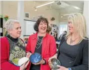  ?? PHOTO: ROBERT KITCHIN/STUFF ?? Potter Rebecca Flowerday, from left, Janet Carlyle and head of art at Queen Margaret College Paulette Pavelich. Students from the college have been making pottery bowls for the Empty Bowls.