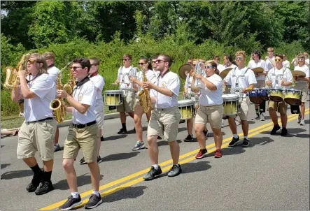  ?? KEITH REYNOLDS — THE MORNING JOURNAL ?? The North Ridgeville High School Marching Band shows their stuff Aug. 11 as part of the parade on the final day of the 45th annual North Ridgeville Corn Festival.