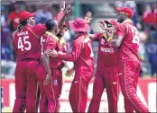  ??  ?? West Indies players celebrate after taking a wicket in Harare on Wednesday. Pic: @twitter
