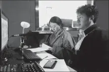  ?? PROVIDED TO CHINA DAILY ?? Top: Dronkar, rear, and Werma, two Tibetans from Hongyuan county, work on a disease prevention broadcast in the Amdo dialect at the county’s TV station.