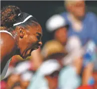  ?? HANNAH MCKAY ASSOCIATED PRESS ?? Serena Williams beat the Czech Republic’s Barbora Strycova in a women’s semifinal singles match Thursday on day 10 of Wimbledon in London.