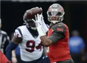  ?? JASON BEHNKEN - THE ASSOCIATED PRESS ?? FILE - In this Dec. 21, 2019, file photo, Tampa Bay Buccaneers quarterbac­k Jameis Winston (3) throws a pass during the first half of an NFL football game against the Houston Texans in Tampa, Fla.