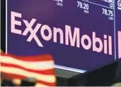  ?? RICHARD DREW AP ?? Exxon Mobil plans to cut 15 percent of its global workforce by the end of next year.