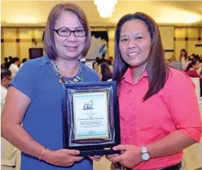  ?? MACKY LIM ?? POWER TANDEM. The power tandem of 8990 Housing Developmen­t Corporatio­n Mindanao - general manager Mary Ann T. Chua and assistant general manager Engineer Juliet B. Domingo.