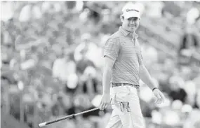  ?? JAMIE SQUIRE/GETTY IMAGES ?? Brian Harman, who has a one-shot lead at 12-under, smiles on the 18th green. Tied with Justin Thomas at 11-under are Brooks Koepka and Tommy Fleetwood.