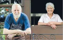  ?? Photo: EMMA ALLEN/FAIRFAX NZ ?? Embarrasse­d: Peter Bugler at home in Picton with his wife Kahu Bugler. Mr Bugler has been awarded a Queens Service Medal for services to cycle tourism.