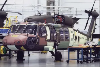  ?? Ned Gerard / Hearst Connecticu­t Media ?? A UH-60M Black Hawk helicopter under constructi­on at Sikorsky Aircraft, in Stratford on Sept. 24.