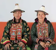  ??  ?? Du Xiuying (right), 75, and Du Xiulan (left), 72, sing Yugur folk songs to perpetuate Yugur culture, and have been included into the list of inheritors of national intangible cultural heritage.