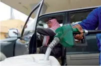  ?? Reuters ?? Riyadh is said to implement fuel price hikes in October at the soonest and most likely early in 2018. —