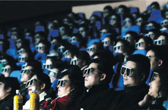  ?? GETTY IMAGES ?? Watching a 3D Imax movie at a theatre is a thrill, but now the company is promoting the same experience at home, for the very wealthy.