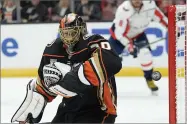  ?? MARK J. TERRILL AP PHOTO BY ?? Anaheim Ducks goaltender Ryan Miller deflects a shot during the third period of an NHL hockey game against the Washington Capitals Sunday, Feb. 17, in Anaheim, Calif. The Ducks won 5-2.