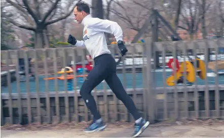  ?? | AL PODGORSKI/SUN-TIMES ?? Mark Buciak is ready for the big race on Monday — his 35th consecutiv­e time running the Boston Marathon.