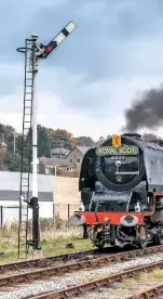  ?? BRIAN DOBBS ?? Suitably adorned with a ‘Royal Scot’ headboard, Duchess of Sutherland departs south from Rawtenstal­l on October 19, the first day of the East Lancashire Railway’s gala.