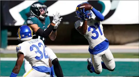  ?? AP Photo/ ?? Los Angeles Rams’ Darious Williams (31) intercepts a pass intended for Philadelph­ia Eagles’ J.J. Arcega-Whiteside (19) during the second half of an NFL football game, on Sunday in Philadelph­ia.