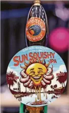  ?? ?? > Bill and Sheila Downs from Florida, who have a beer named Sun Squishy on tap at the 46th Newcastle Beer and Cider Festival at Northumbri­a University