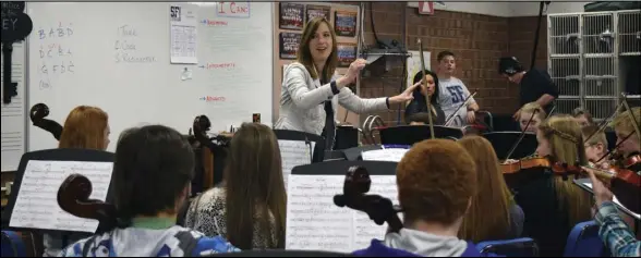  ??  ?? Fork Junior High School music teacher Angela Harman has been honored by the Utah Music Educators Associatio­n with the Superior Accomplish­ment Award in recognitio­n of her outstandin­g work in educating music students in Spanish Fork and around the world.