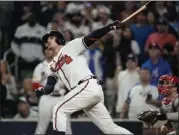  ?? JOHN BAZEMORE – THE ASSOCIATED PRESS ?? The Braves' Austin Riley slugs a go-ahead, two-run homer in the eighth inning against the Phillies in Game 2 of the NLDS.