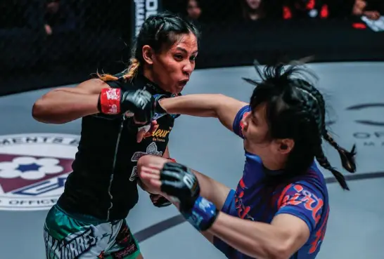  ??  ?? TOUGH CONTEST. The Philippine­s' Jomary Torres believes a win against Ritu Phogat will catapult him to the rankings of ONE women’s atomweight division. ONE photo
