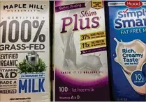  ??  ?? As plant-based milks gain more consumers, the dairy industry is responding with products of its own such as organic cow’s milk.