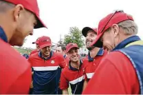  ?? Warren Little / Getty Images ?? Justin Thomas celebrates with United States teammates after a win during Sunday singles matches at the 43rd Ryder Cup.