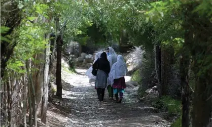  ??  ?? Women walking in rural Pakistan. Photograph: Aamir Qureshi/AFP via Getty Images