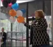  ?? PHOTO PROVIDED ?? Former Record editor Lisa Lewis speaks at a grand opening event for The News Apartments in downtown Troy.