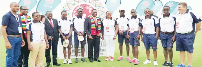  ??  ?? President Mnangagwa (centre) poses with the Zimbabwe Special Olympics golf team in Abu Dabhi, United Arab Emirates