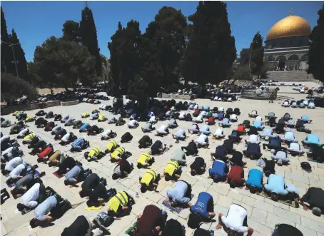  ?? Photo/Supplied ?? Muslims are seen attending congregati­onal prayer while maintainin­g social distancing on Friday at Al-Aqsa Mosque, which is located in the Old City of Jerusalem.