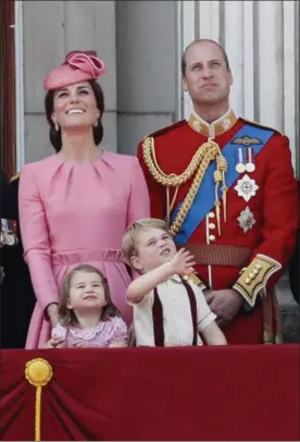  ?? KIRSTY WIGGLESWOR­TH — THE ASSOCIATED PRESS FILE ?? Britain’s Kate, The Duchess of Cambridge, Prince William and their children Princess Charlotte and Prince George appear on the balcony of Buckingham Palace, after attending the annual Trooping the Colour Ceremony in London. Kensington Palace says...