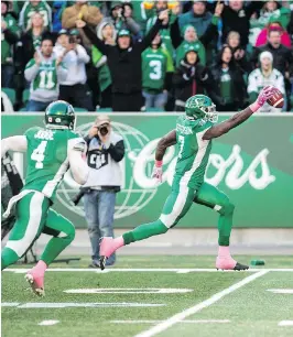  ?? BRANDON HARDER ?? Roughrider­s defensive lineman Willie Jefferson takes off on a game-changing intercepti­on return for a touchdown in Monday’s 19-12 win at Mosaic Stadium.