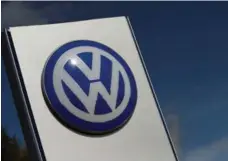  ?? HANNIBAL HANSCHKE/REUTERS FILE PHOTO ?? Well before the emissions scandal, Volkswagen was making only a slim profit margin on VW-branded cars because production costs were high.