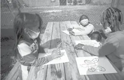  ?? KASSIJACKS­ON/HARTFORD COURANT ?? Students from Community First School, an independen­t school serving children in the North End, Upper Albany and Clay Arsenal neighborho­ods of Hartford collective­ly designated the Promise Zone, take a field trip in September to Ebony Horsewoman Equestrian and Agricultur­al Center in Keney Park in Hartford.