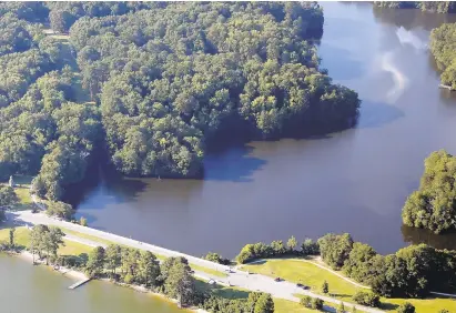  ?? JONATHON GRUENKE/STAFF FILE ?? The Mariners’ Museum board of trustees voted to change the lake’s name to The Mariners’ Lake on June 19.