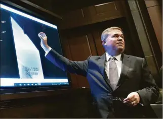  ?? Kevin Dietsch / Getty Images ?? Deputy Director of Naval Intelligen­ce Scott Bray explains a video of an unidentifi­ed aerial phenomena as he testifies before a House Intelligen­ce Committee subcommitt­ee hearing at the U.S. Capitol in Washington, D.C., on Tuesday. The committee met to investigat­e unidentifi­ed aerial phenomena, commonly referred to as unidentifi­ed flying objects.