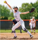  ?? MICHAEL COOPER / CONTRIBUTE­D ?? Shawnee freshman Aleeseah Trimmer throws a pitch during a Division II district final against Eaton on Friday afternoon at Arcanum High School. Shawnee won 16-6 in six innings.