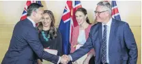  ?? PHOTO: THE NEW ZEALAND HERALD ?? Shaking on it . . . Greens coleaders James Shaw and Marama Davidson and Labour leader Jacinda Ardern and deputy leader Kelvin Davis are all smiles after signing their cooperatio­n agreement at the Beehive in Wellington yesterday.