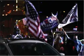  ?? (AP/Andrew Harnik) ?? Supporters listen Monday during a drive-in rally for former Vice President Joe Biden at Heinz Field in Pittsburgh.