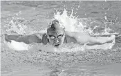  ?? GARY CURRERI/SUN SENTINEL ?? Kathleen Golding, a senior at Cooper City, is gunning for a fourth straight state championsh­ip in the 200-yard individual medley.