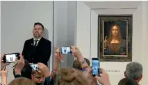  ?? PHOTO: REUTERS ?? Salvator Mundi, the last privately owned Leonardo da Vinci painting, is displayed at Christie’s auction house in New York before its impending sale.