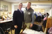  ?? (Photo by Joe Spaulding) ?? Indiana Gubernator­ial candidate Eric Doden, left, is shown with Berne Mayor Gregg Sprunger prior to the beginning of the Adams County Republican Party meeting Thursday night at the Berne Diner. Doden was the featured speaker for the event and outlined his goals and vision for what state government would be if he is elected in the May 7 primary.